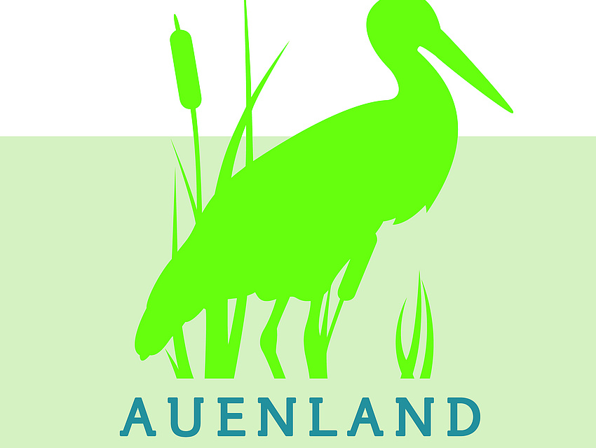 Auenland-Logo: Der grüne Storch leitet den Weg